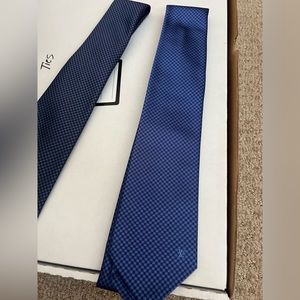 Louis Vuitton tie.